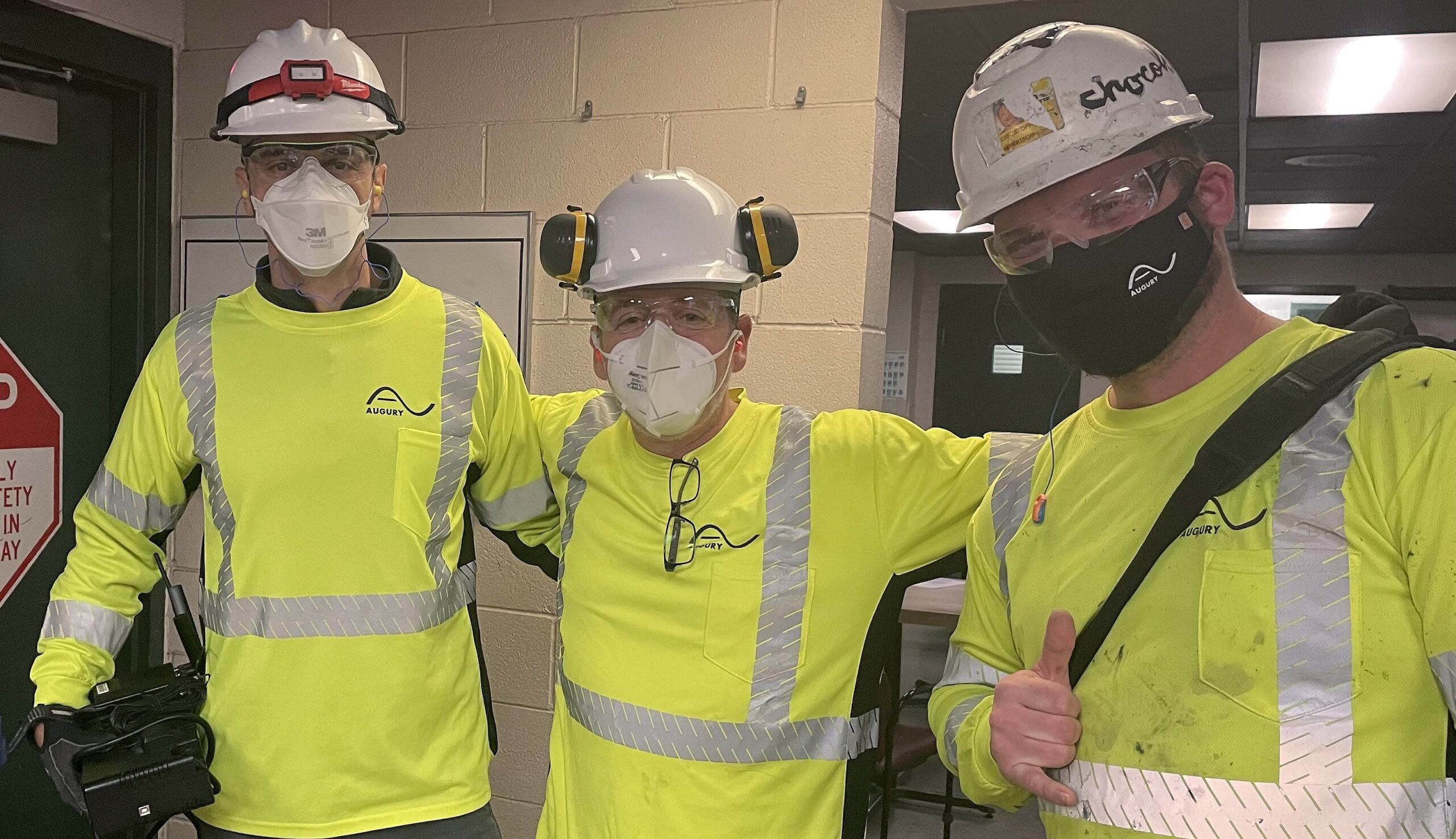 Augury team in factory wearing safety gear