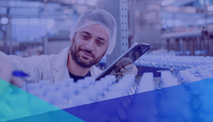 Manufacturing worker checking production output