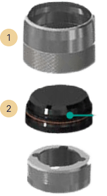 Image showing three distinct mechanical parts labeled 1 and 2. Part 1, a cylindrical metal piece, part 2 appears to be a sealed, rounded component with a small marking, possibly from Baker Hughes. At the bottom is an unmarked round part.
